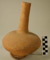 Pottery jar with long, thin neck, ring base - light brown, probably faded from r