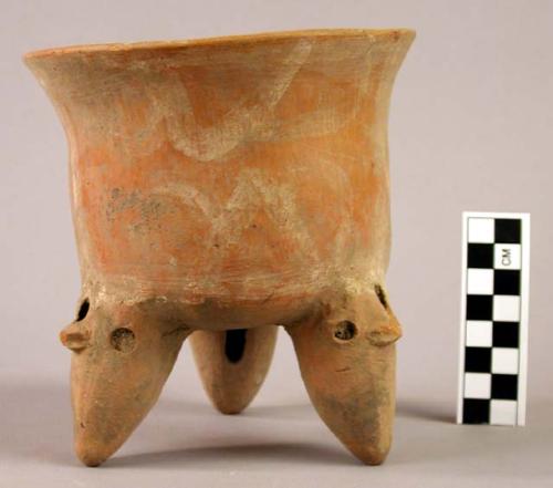 Tripod polychrome pottery vessel (one leg broken off)