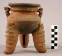 Carbonera Applique pottery tripod jar
