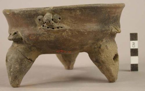 Tripod vessel, incised decoration