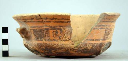 Polychrome pottery tripod bowl - (legs missing) - 2 effigy lugs