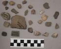 14 fragments unglazed pottery; 10 fragments quartz and limestone; 15 fragments s