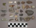 Quartz, stone pieces, glass, unknown substance, bone
