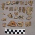 14 fragments quartz and limestone; 84 fragments stone; fragment bone