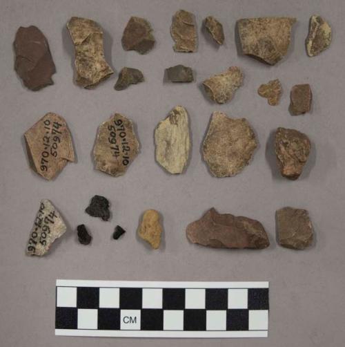 7 fragments quartz and limestone; 54 fragments stone; 2 fragments charcoal; 1 fr