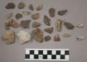 48 quartz chips, 2 stone chips; 114 stone chips; 2 fragments bone