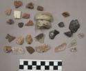 3 glass, 1 glass fragment, 3 pottery, chipping waste, 4 coal?, 1 shell fragment,