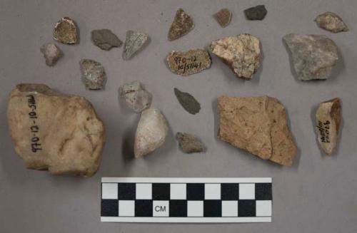 10 limestone and quartz fragments; 10 stone chips