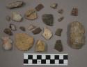 39 limestone and quartz chips; 56 stone chips; 1 stone fragment (broken arrowhea