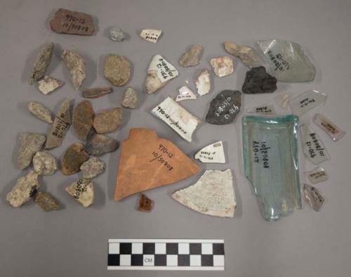 5 glass, 3 glass fragment, 6 pottery, 1 ceramic potsherd, 1 potsherd with blue g