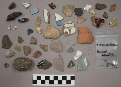 Chipping waste, pottery, glass, quartz, pottery sherds