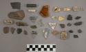 Pottery sherd, pipe stem fragment, glass, pottery, chipping waste, bone, tooth,