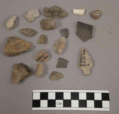 9 fragments quartz and limestone, 14 fragments stone, 2 fragments unglazed potte