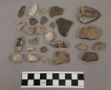 12 fragments limestone and quartz; 5 fragments unglazed pottery; 26 stone fragme