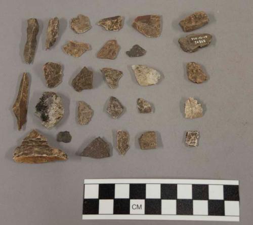 22 fragments quartz and limestone; 55 stone fragments; 3 fragments unglazed pott