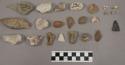 107 fragments quartz and limestone; 77 fragments stone; 1 fragment bone