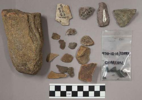 29 fragments quartz and limestone; 81 fragments stone; fragments charcoal