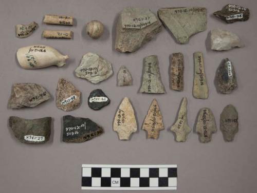 32 bifacial fragments; 6 projectile points; 1 fragment glazed china; 1 stone bal