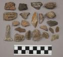 10 fragments quartz and limestone; 27 fragment stone; 21 fragments unglazed pott