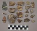 22 fragments quartz and limestone; 1 fragment bone; 27 fragments stone; 1 whole