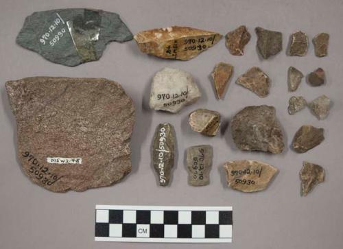 24 fragments quartz and limestone; 112 fragments stone; 4 bifacial fragments; 1