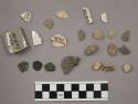 5 fragments quartz and limestone; 5 fragments glazed pottery; 1 fragment unglaze