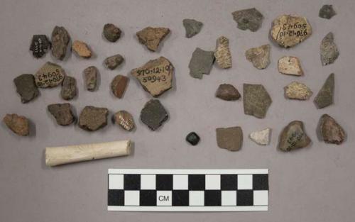 7 fragments quartz and limestone; 26 fragments stone; 7 fragments unglazed potte