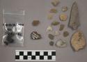 27 fragments quartz and limestone; 6 fragments charcoals; 46 fragments stone; 2