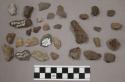 3 fragments quartz and limestone; 10 fragments unglazed pottery; 20 fragments st