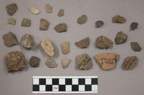 10 fragments quartz and limestone; 25 fragments unglazed pottery; 28 fragments s