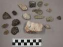 25 pieces quartz; 83 stone chips; 1 piece coal (?); 7 pieces unglazed pottery