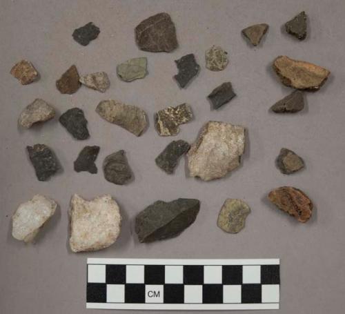 41 stone chips; 8 pieces quartz; 9 pieces unglazed pottery; 3 flakes, possibly s