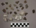 4 fragments quartz and limestone; 31 flakes stone; 1 fragment charcoal; 1 fragme