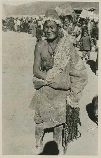 Man standing in monastery marketplace