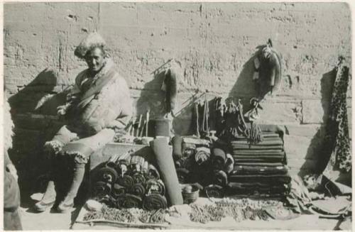 Trader with his homespuns, trinkets, ornaments, yak-hair ropes, etc.