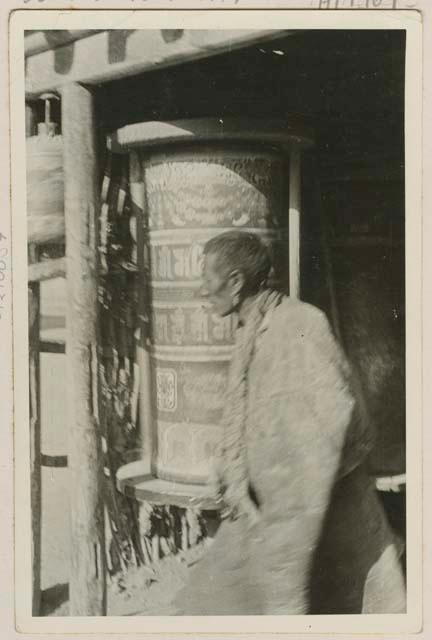 Man in front of Mani Drums