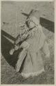 Young Tibetan boy in sheepskin coat