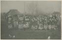 Men and women dancing at bear ceremony