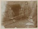 Ainu Woman weaving a girdle