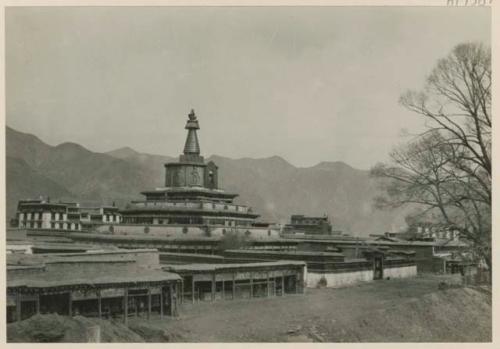 Golden stupa with temple structures around it