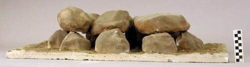 MODEL of a stone structure (cairn?)