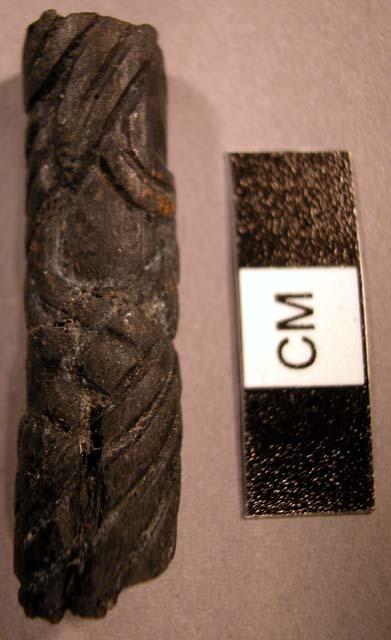 Fragment of carved wooden object