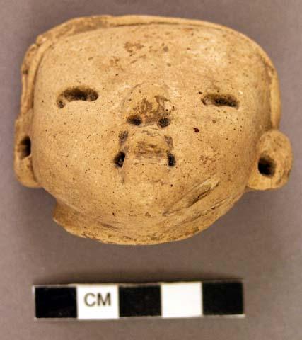 Pottery figurine head (human)