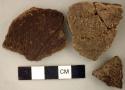 Ceramic, earthenware body sherds, dentate and incised, one is mended to 34429