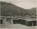 View of temples and sheds with prayer wheels inside, Labrang, Tibet