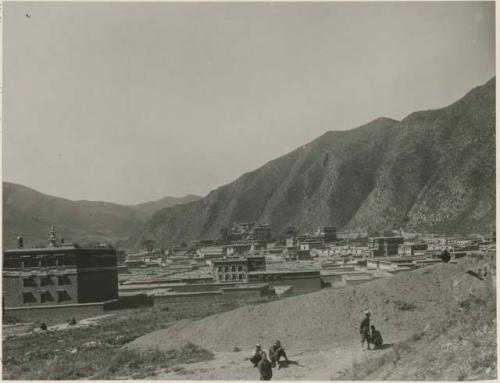 Temple buildings with landscape and people, Labrang, Tibet