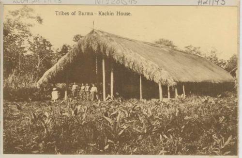 People in front of house