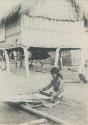 Tingian woman weaving on a loom