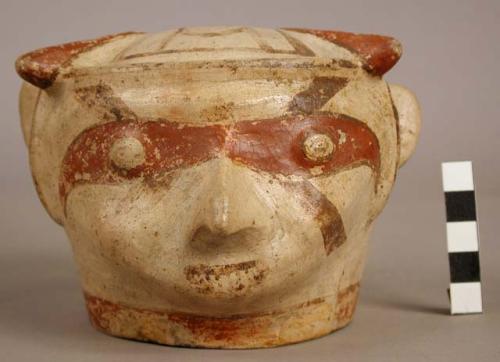 Polychrome pottery effigy jar cover