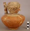 Polychrome pottery effigy jar with spout
